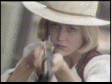 Mattie and her rifle